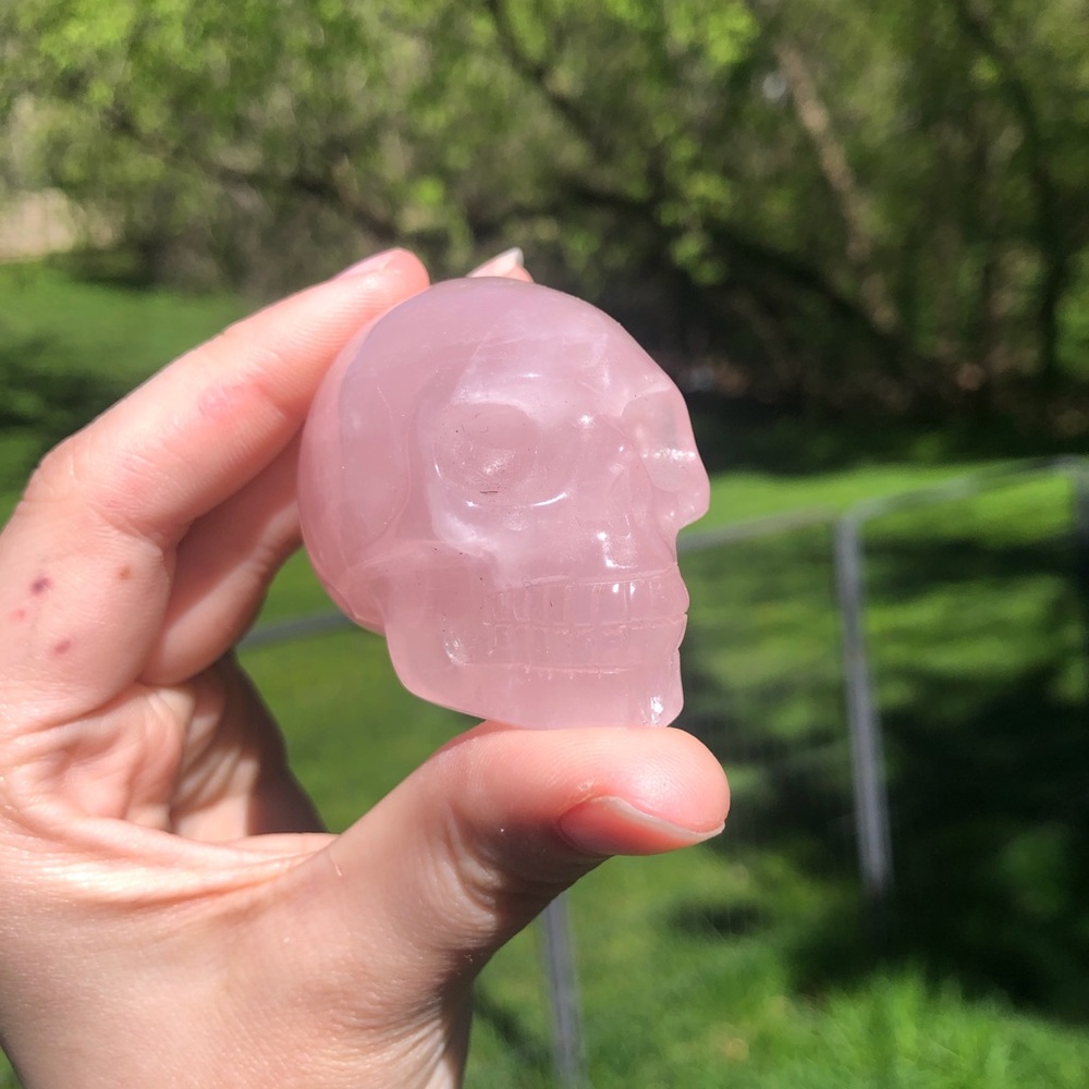 Rose quartz crystal skull carving